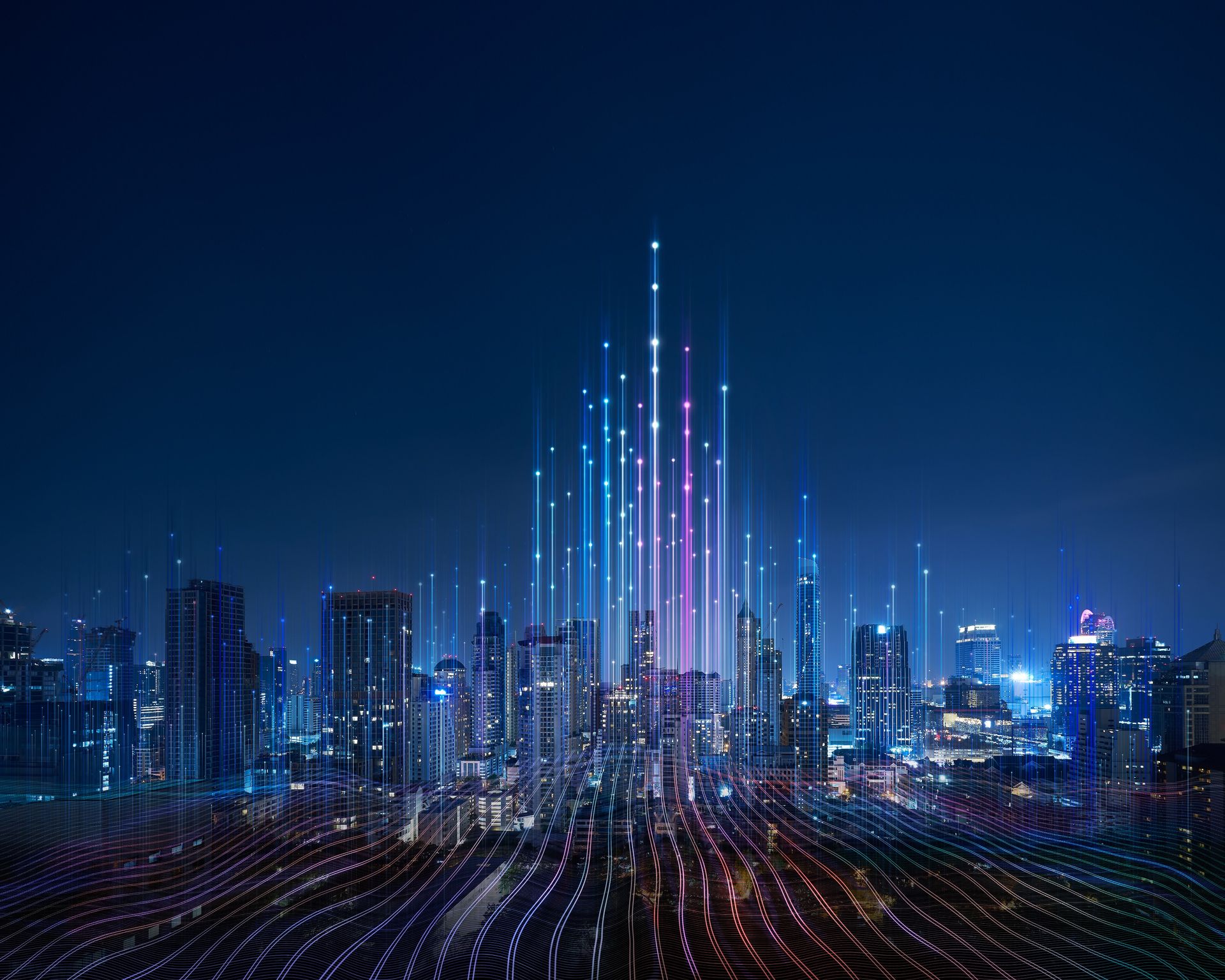 Illuminated skyline of a large city at night.